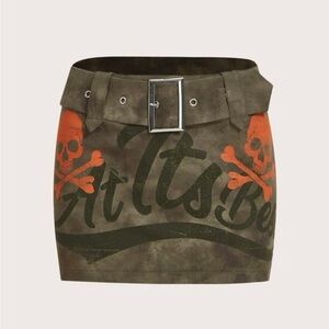 Black cargo jeans, light wash baggy jeans, and mini army green skirt.